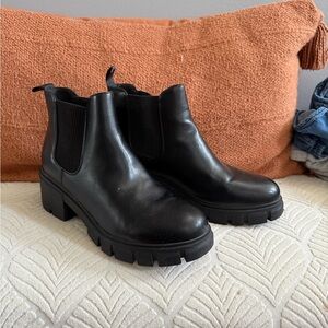 Elegant Black Leather Heeled Boots